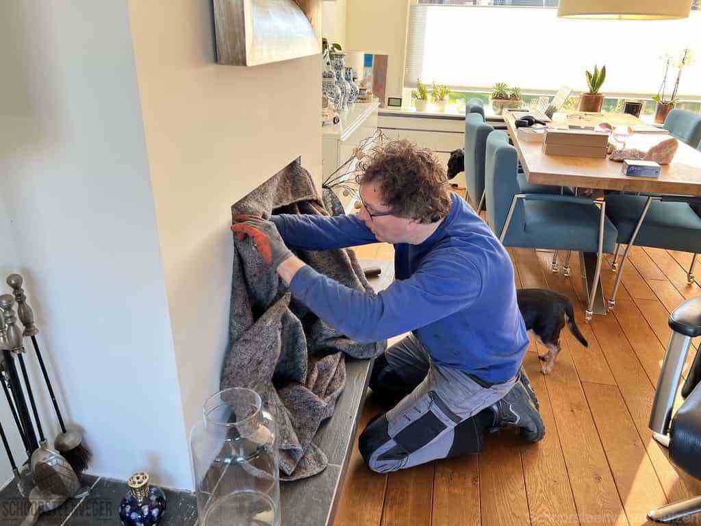 Schouwveger Huizen kleed schoorsteenreiniger Schouwveger Huizen kleed schoorsteenreiniger